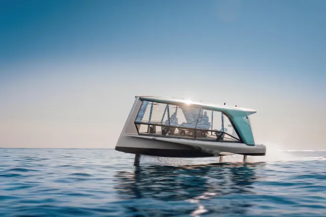 Experience the revolutionary £2,100,000 flying glass yacht, THE ICON, which hovers above water and features a bespoke Hans Zimmer soundtrack, redefining luxury and innovation in marine travel.