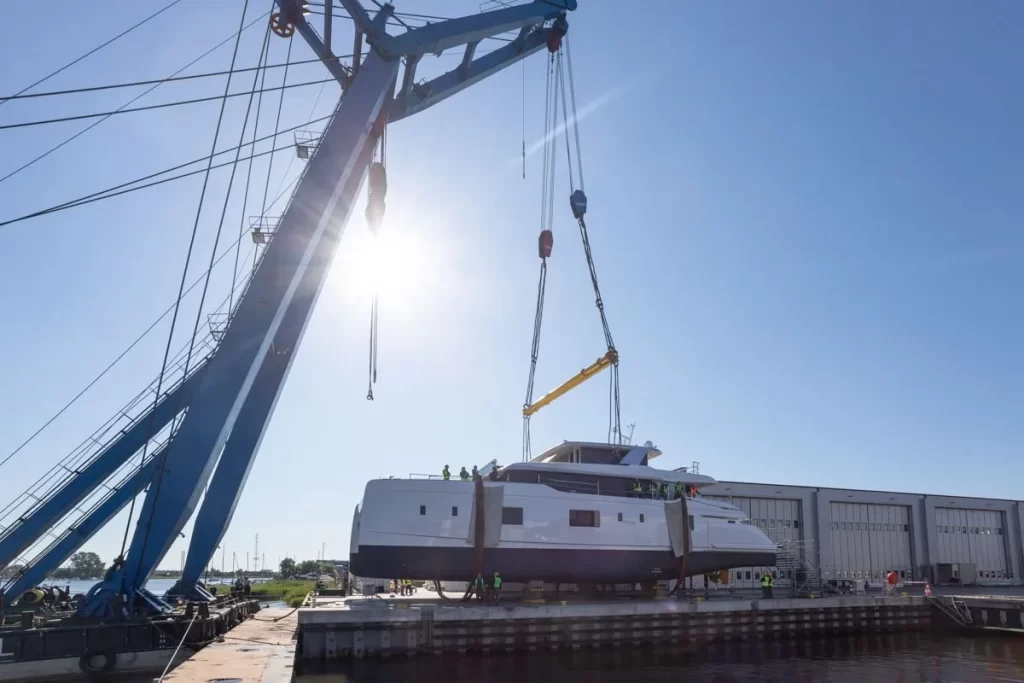 Sunreef Yachts launches the 100 Sunreef Power 2.0, a luxurious catamaran featuring innovative design, a full-beam master stateroom, expansive beach club, and advanced performance capabilities.