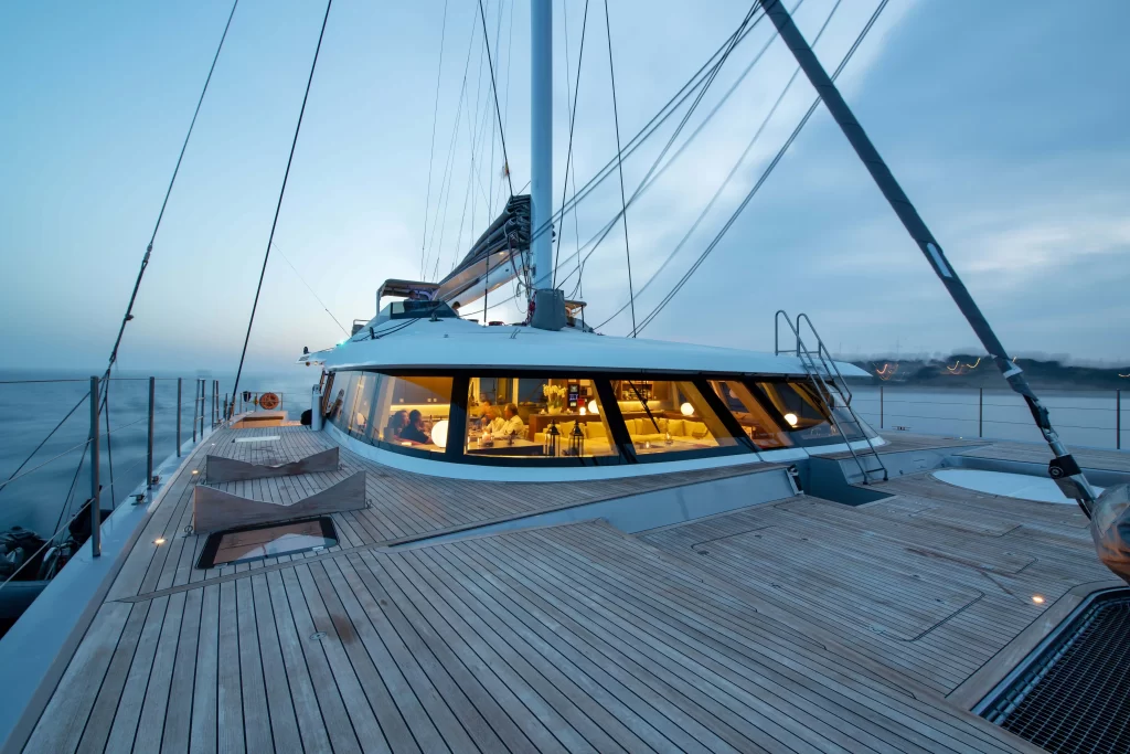 The world’s largest carbon fibre catamaran, Mousetrap, is for sale at $19.2M. This 110-foot luxury yacht offers innovative sailing tech, spacious living areas, and high-end amenities.