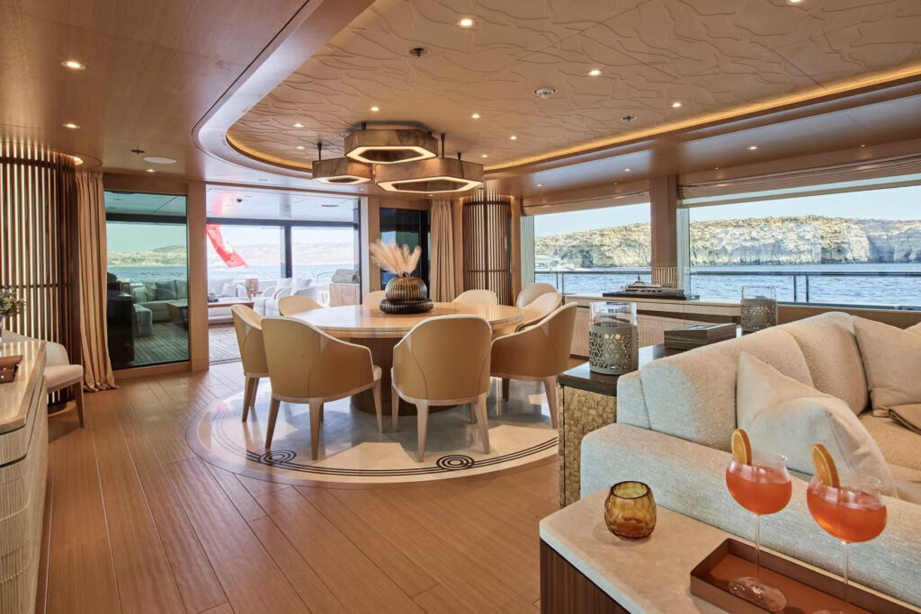 The Amels 60 "COME TOGETHER" yacht, delivered in 2022, features Espen Øino's timeless design, hybrid technology, and luxurious interiors by Winch Design, setting a new standard in luxury yachting.