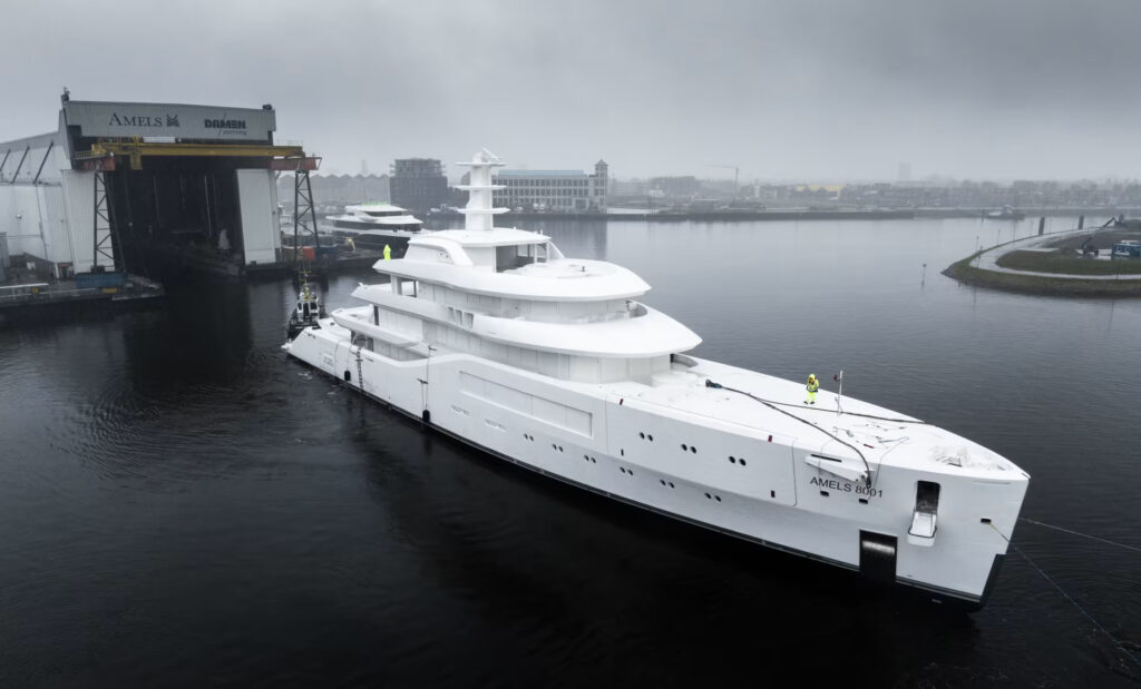 The first Amels 80, a groundbreaking 80-metre yacht, arrives in the Netherlands. Designed by Espen Øino, it combines luxury with innovative sustainability, ready for 2025.