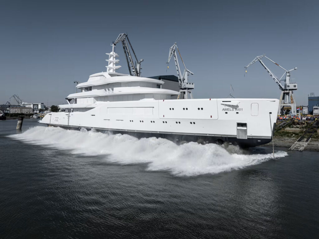 The first Amels 80, a groundbreaking 80-metre yacht, arrives in the Netherlands. Designed by Espen Øino, it combines luxury with innovative sustainability, ready for 2025.