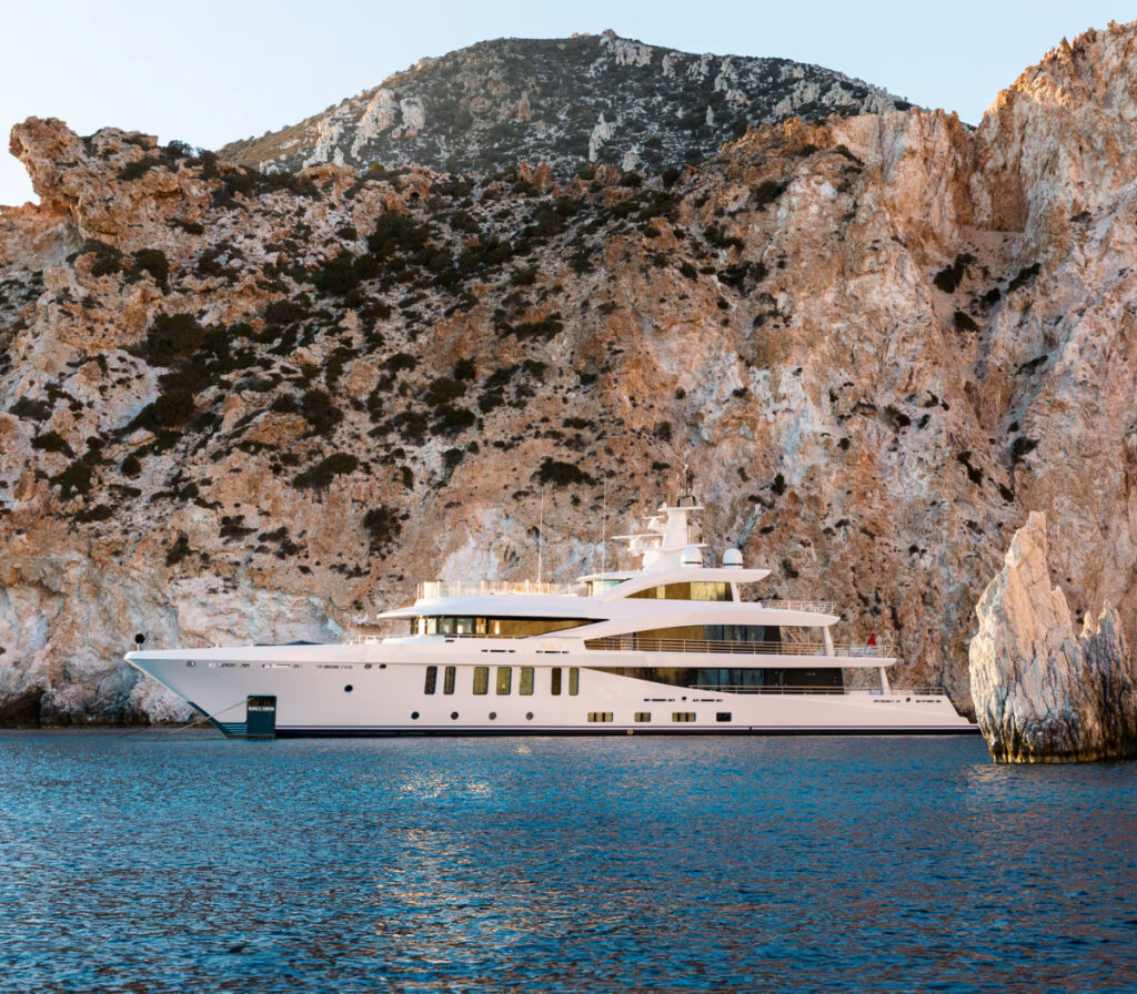 STELLA M, the first Amels 200 superyacht, combines luxury and innovation with hybrid power, sleek Tim Heywood design, and custom interiors by Reymond Langton, delivered in 2021.