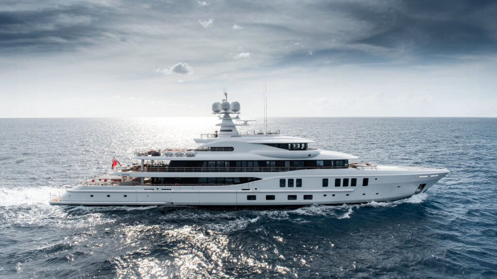 SYNTHESIS, a 74-metre Amels superyacht, blends performance and luxury with custom designs, featuring a dedicated Owner's Deck, foredeck jacuzzi, and seamless indoor-outdoor spaces.