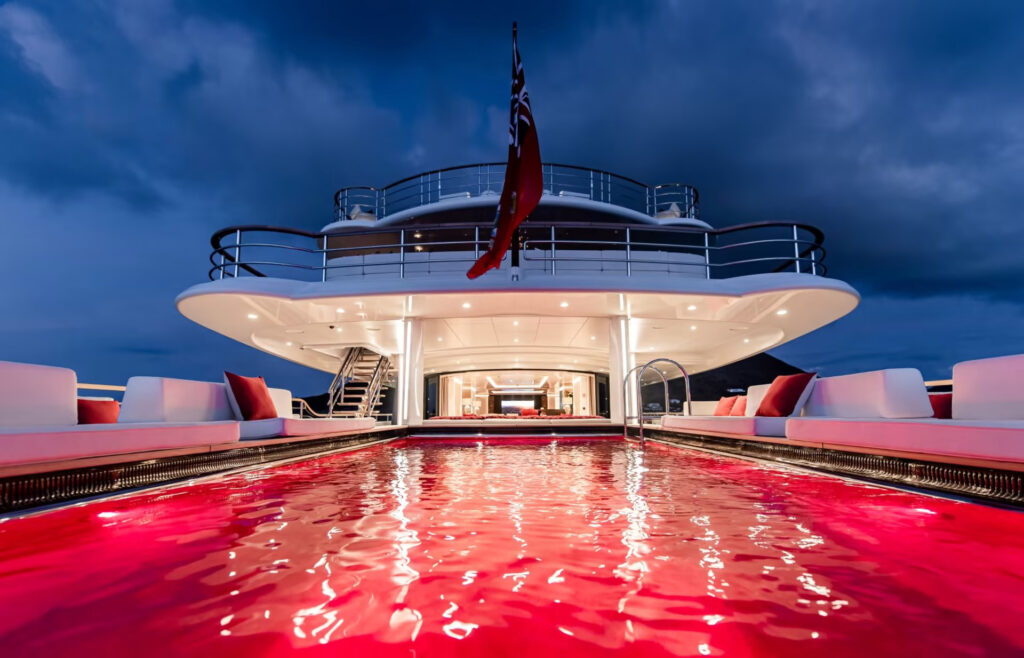 SYNTHESIS, a 74-metre Amels superyacht, blends performance and luxury with custom designs, featuring a dedicated Owner's Deck, foredeck jacuzzi, and seamless indoor-outdoor spaces.