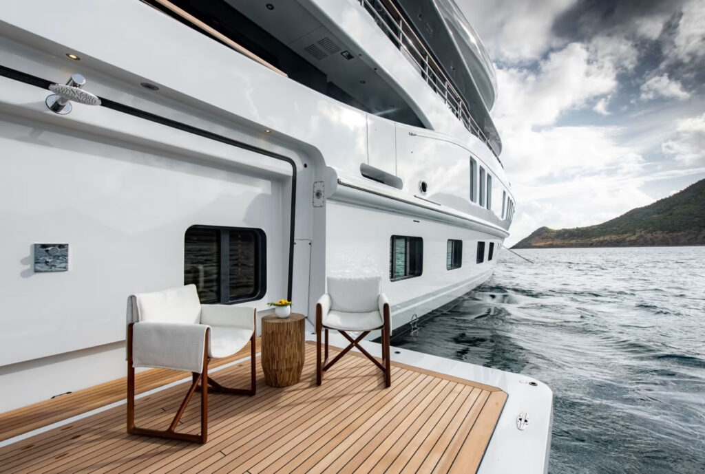 SYNTHESIS, a 74-metre Amels superyacht, blends performance and luxury with custom designs, featuring a dedicated Owner's Deck, foredeck jacuzzi, and seamless indoor-outdoor spaces.