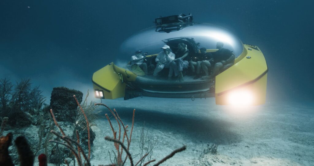 A luxury UFO-like submarine takes passengers 200m deep for fine dining, spa treatments, and even weddings, offering a futuristic underwater adventure.