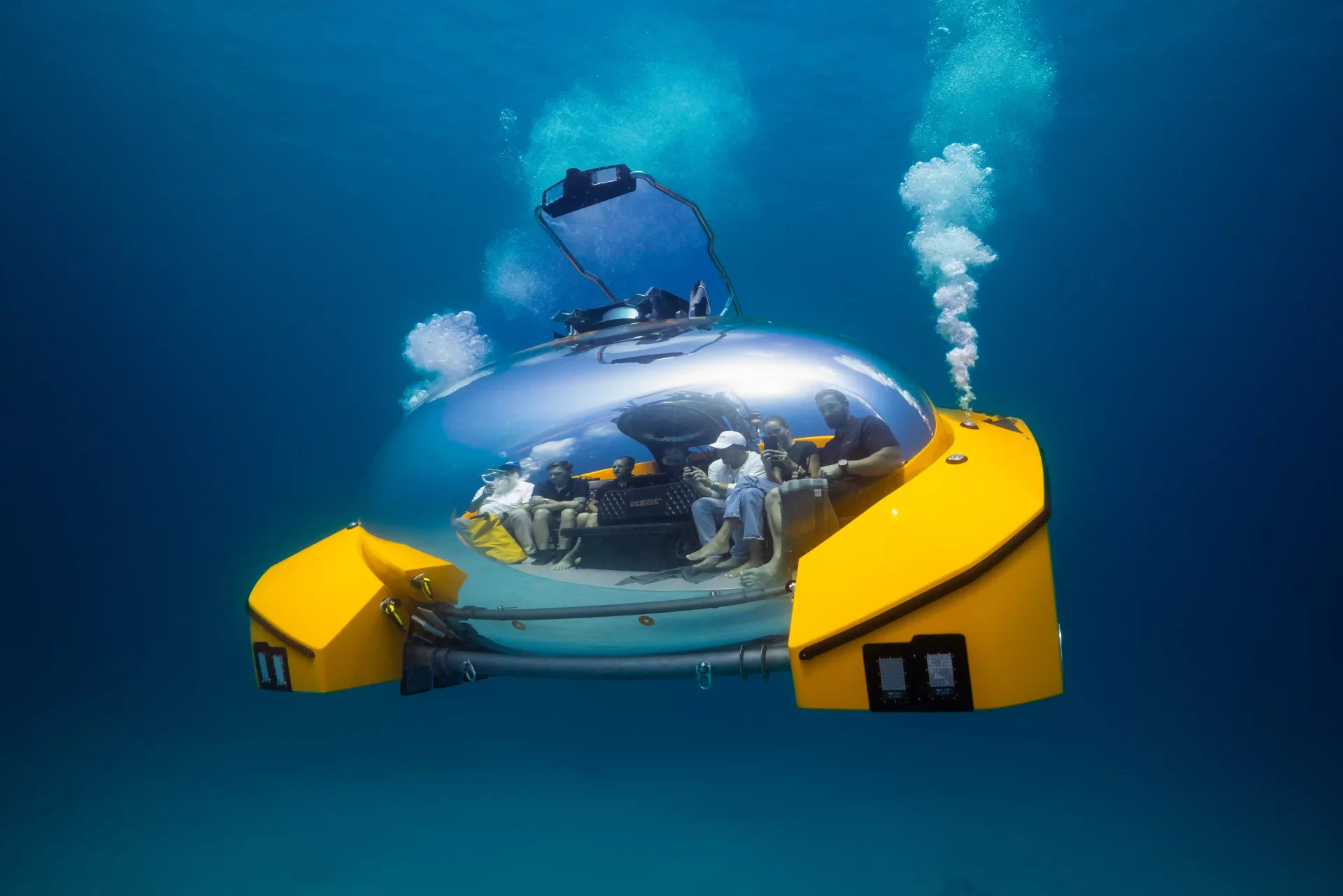 A luxury UFO-like submarine takes passengers 200m deep for fine dining, spa treatments, and even weddings, offering a futuristic underwater adventure.