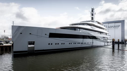 Feadship's new £170 million superyacht, Moonrise, is designed for near silence at sea, featuring luxury amenities like a gym, cinema, and a sleek, antenna-free design.