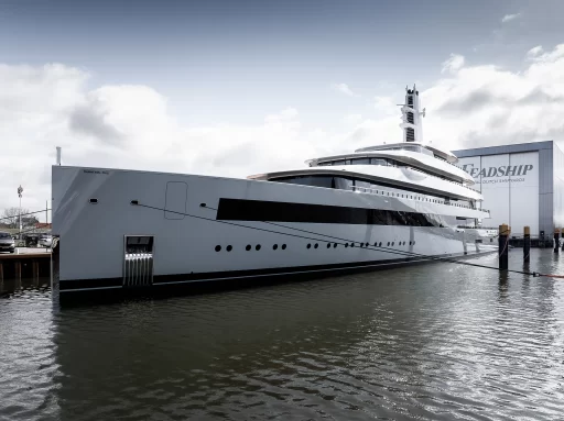 Feadship's new £170 million superyacht, Moonrise, is designed for near silence at sea, featuring luxury amenities like a gym, cinema, and a sleek, antenna-free design.